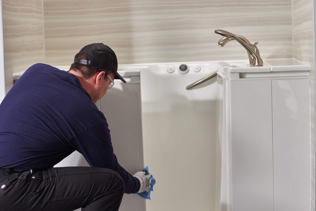 Rite Window professional installing a walk-in tub