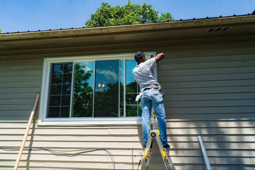 Rite Window professional installing a window