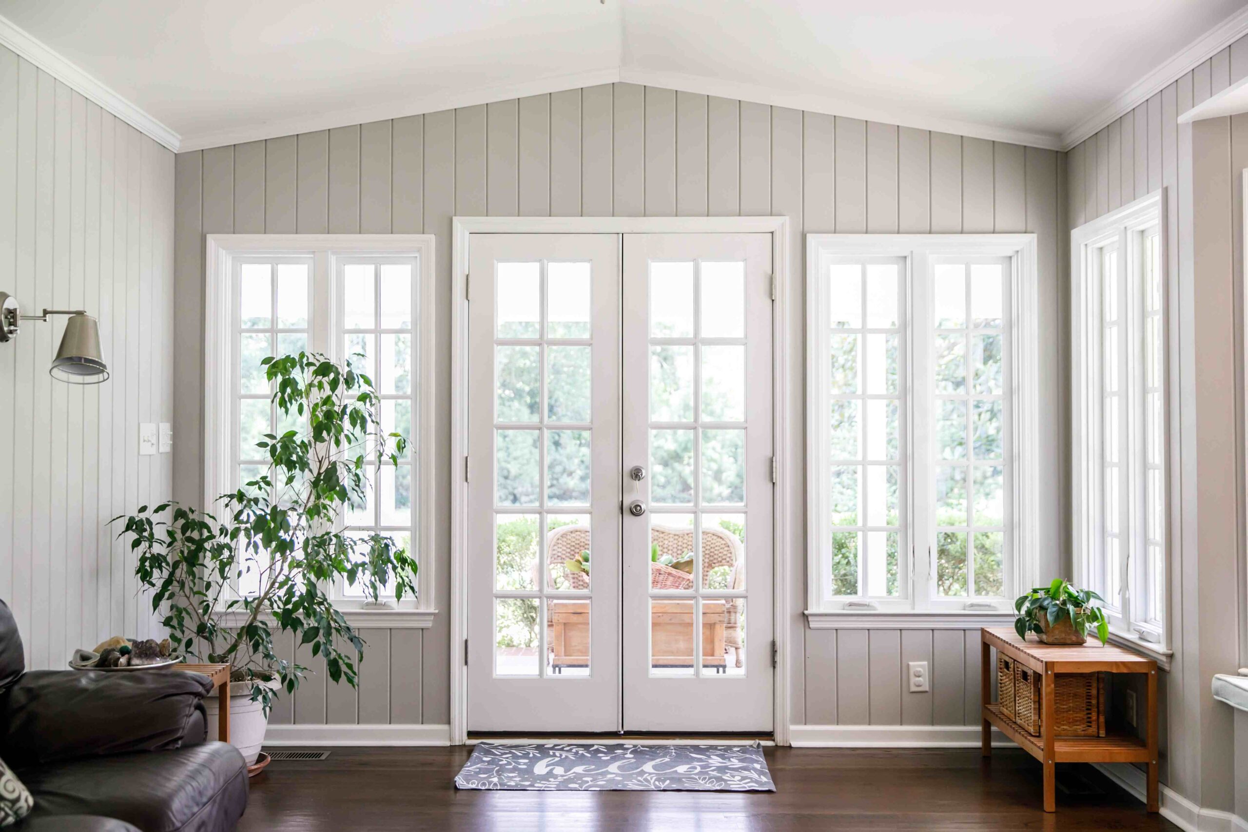 sunroom with white vinyl windows