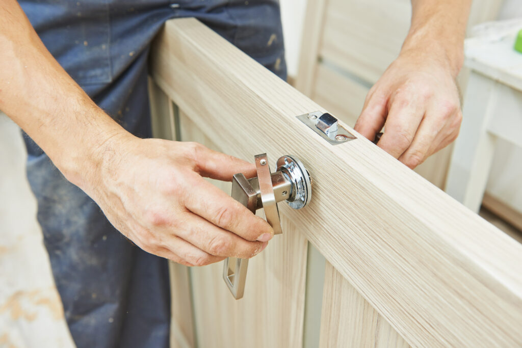 Man inspecting new door